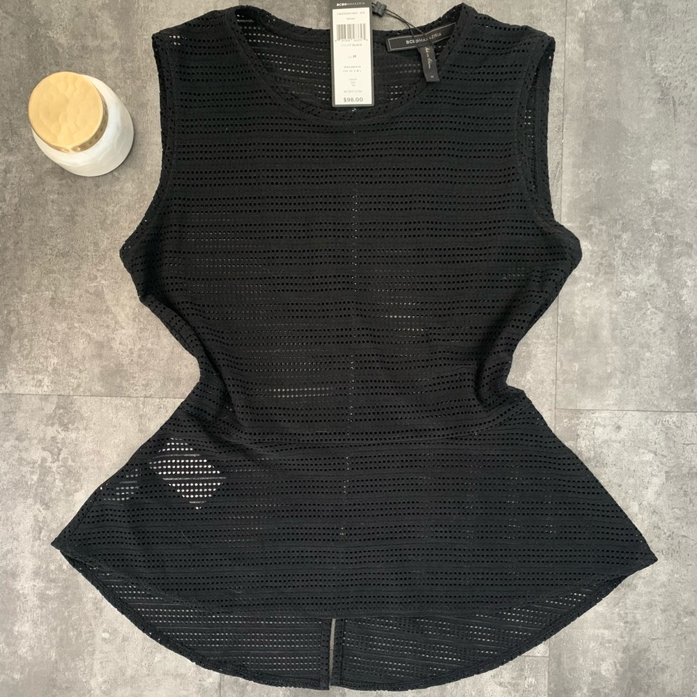 BCBG Black peplum top with silver zipper back.